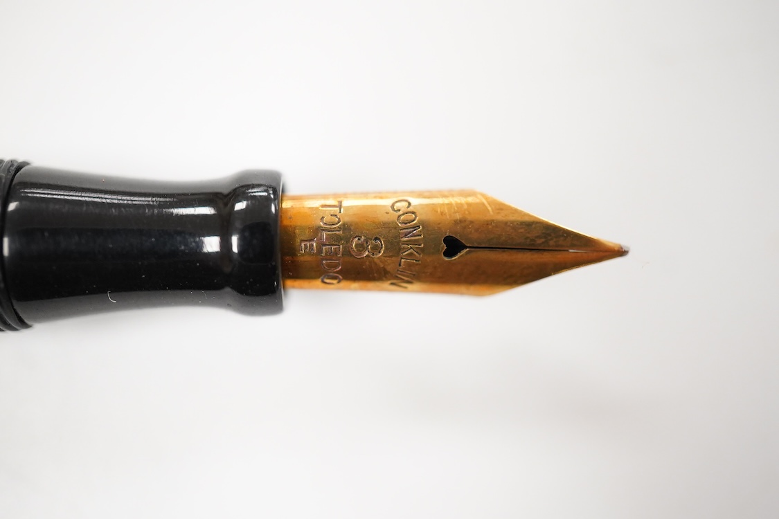 A Conklin gold filled crescent filler with Conklin No. 3 Toledo nib